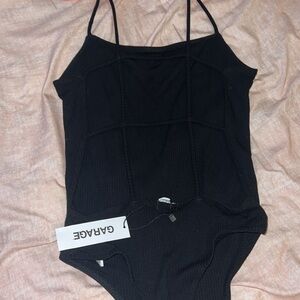 GARAGE backless strapy body suit. NEW WITH TAGS